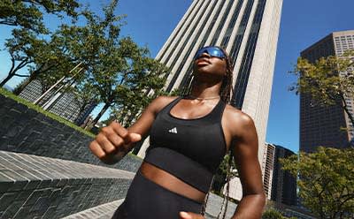 Model wears adidas bra