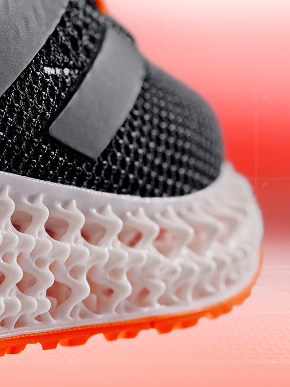 Frontal view of the new 4DFWD running shoe, showing the innovative lace system and Primeknit+ Upper