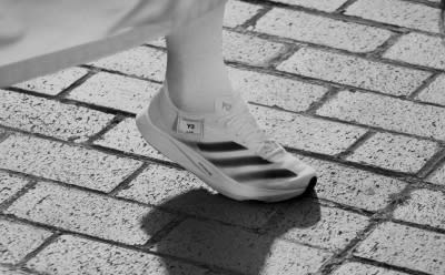 A closeup of a white adidas sneaker. 