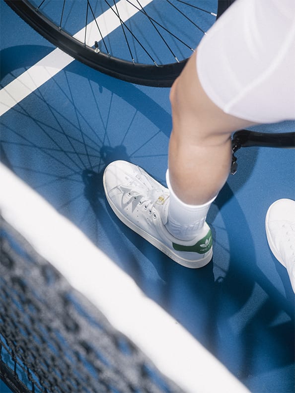 Model on bike with close up of product.