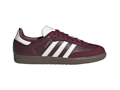 A pair of burgundy and white Adidas Samba sneakers on a plain white background.