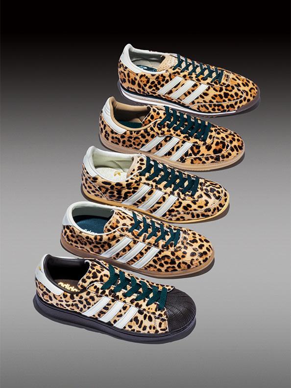 A collection of leopard-print sneakers in various colors and styles, arranged in a dynamic, overlapping composition against a dark background.