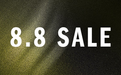 The image displays the text "8.8 SALE" in large white letters against a dark, textured background.