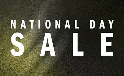 The image displays the text "NATIONAL DAY SALE" against a dark background, with the word "SALE" in large, bold letters.