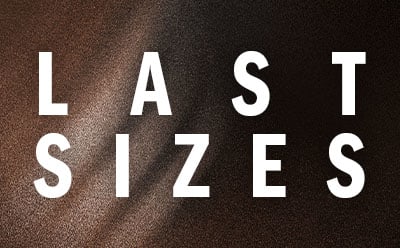 The image displays the text "LAST SIZES" in large, bold letters against a dark, textured background.
