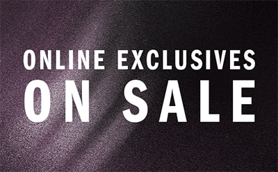 The image displays a purple background with the text "ONLINE EXCLUSIVES ON SALE" prominently displayed in white lettering.