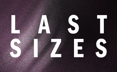The image displays the text "LAST SIZES" in large, bold letters against a dark, textured background.