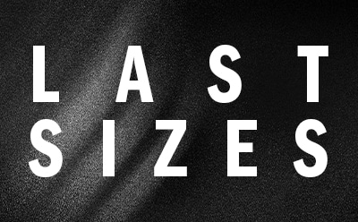 The image displays the text "LAST SIZES" in large, bold white letters against a dark, textured background.