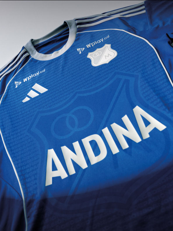 The image shows a blue and white soccer jersey with the word "ANDINA" prominently displayed on the front.