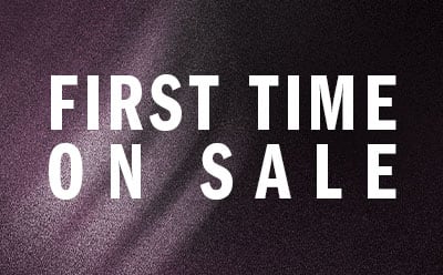 The image displays the text "FIRST TIME ON SALE" in large white letters against a dark purple or burgundy background.