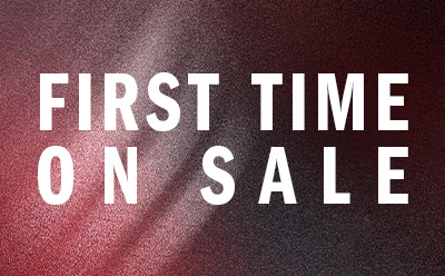 The image displays the text "FIRST TIME ON SALE" against a burgundy or maroon-colored background.