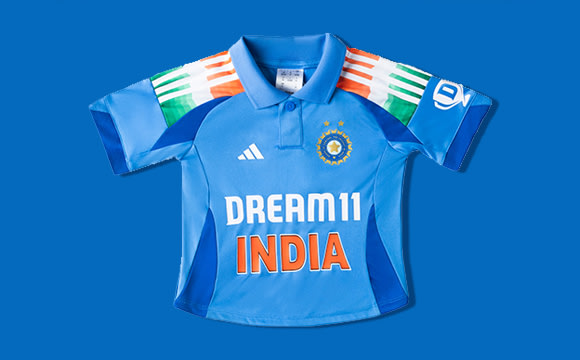A blue cricket jersey with the text "DREAM11 INDIA" prominently displayed against a vibrant blue background.