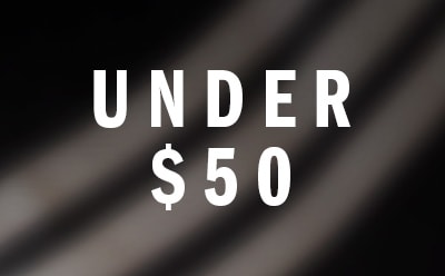 The image displays the text "UNDER $50" in large, bold white letters against a dark, blurred background.