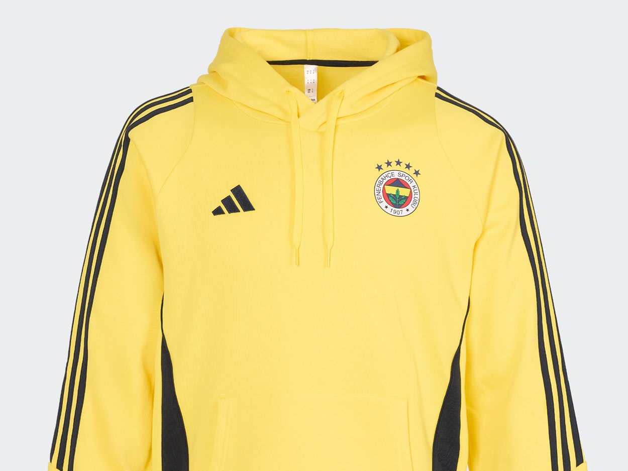 A yellow hooded sweatshirt with the Fenerbahçe logo and Adidas stripes on the sleeves is displayed against a plain white background.