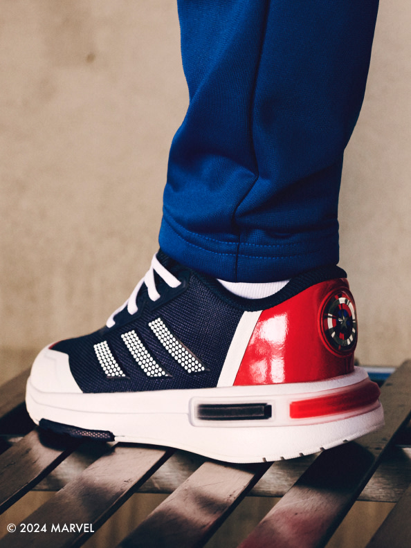 Focus on foot wearing the adidas | Avengers collection