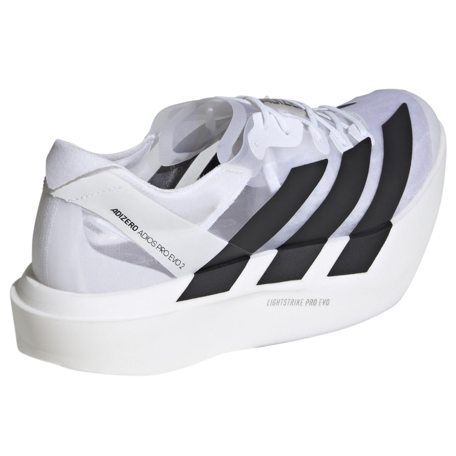 A pair of white and black athletic shoes with a distinctive design and platform sole.