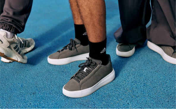 A close-up of someone’s feet wearing a pair of adidas Supernova Rise W Earth Day shoes.