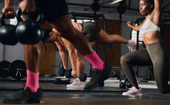 Group shot of trainers working out in adidas Dropset 3's.