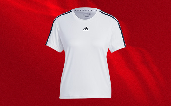 A white Adidas sports jersey with black stripes on a vibrant red background.