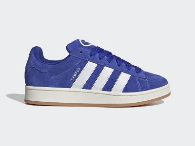 A pair of blue Adidas Campus sneakers with white stripes and a gum sole, set against a plain white background.