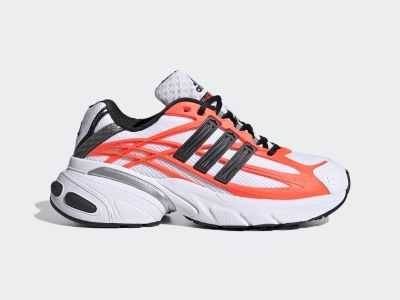 A pair of vibrant, sporty sneakers with a bold, eye-catching design featuring a combination of white, black, and bright orange colors.