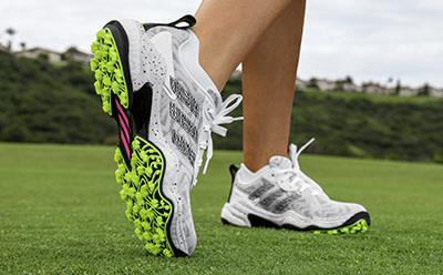 Laced golf shoe