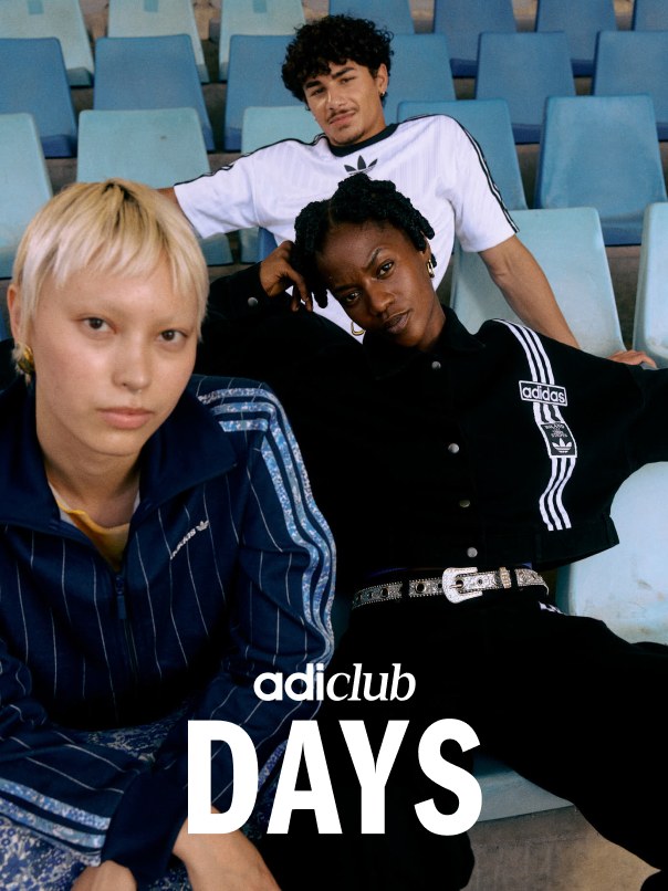 Three people relaxing on the bleachers of a sports facility giving attitude to the camera.