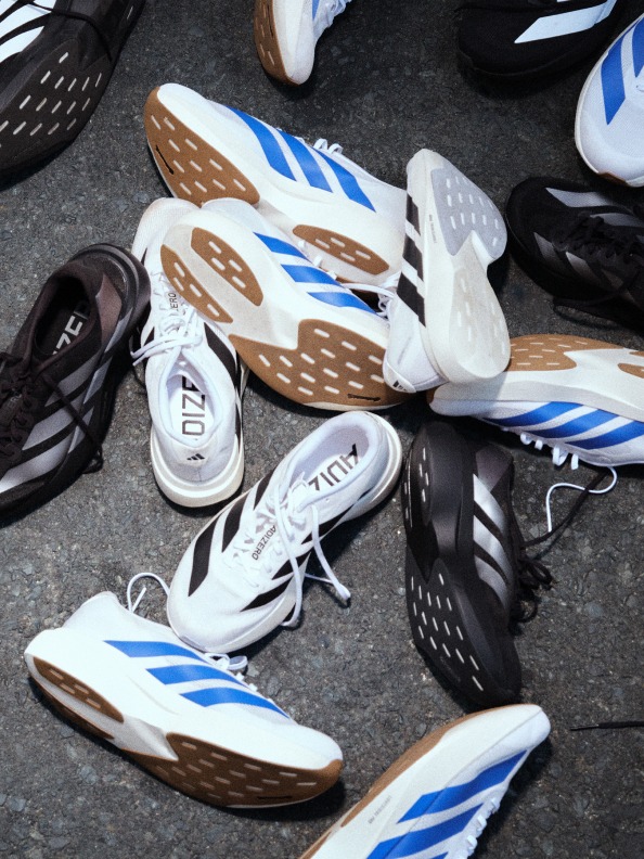 Images showing men and women in Adizero EVO SL colourways, in running and lifestyle scenarios.