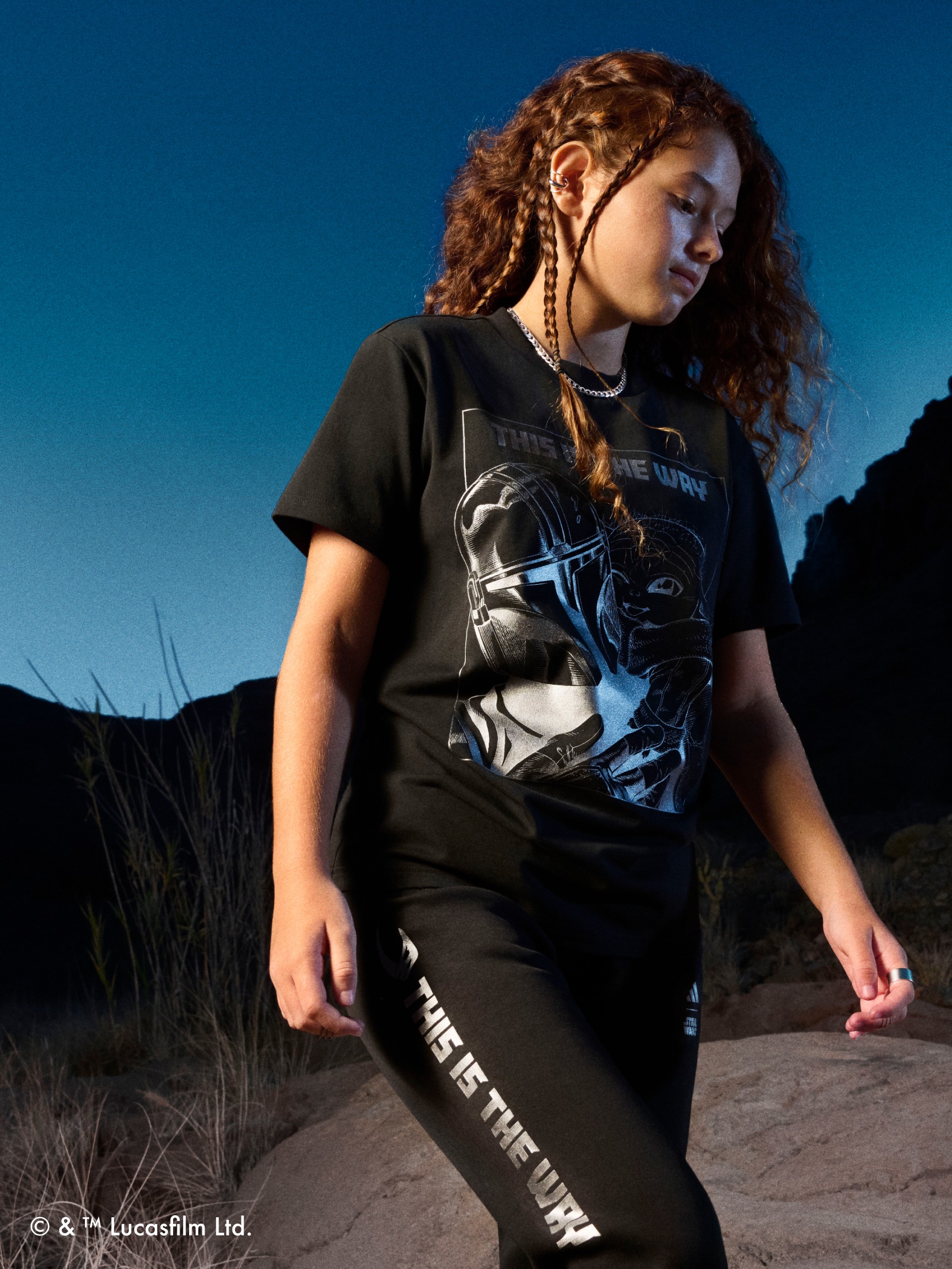 Close up of child walking wearing the adidas | Star Wars: The Mandalorian™ collection