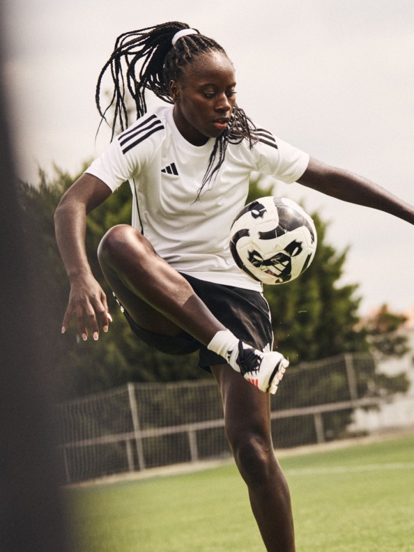 Three female footballers wearing the F50, Predator and Copa during practice