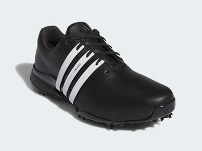 Sneaker bianche e nere con lacci e dettagli ispirati a uno sfondo minimal.