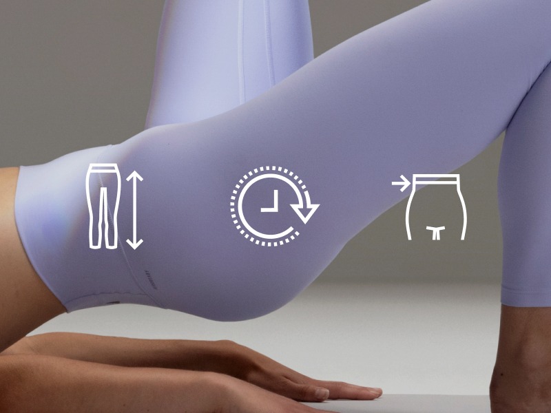 The image shows a person's arm with various icons or symbols printed on it, including an arrow pointing up, a clock icon, and an icon resembling a glass or bottle.