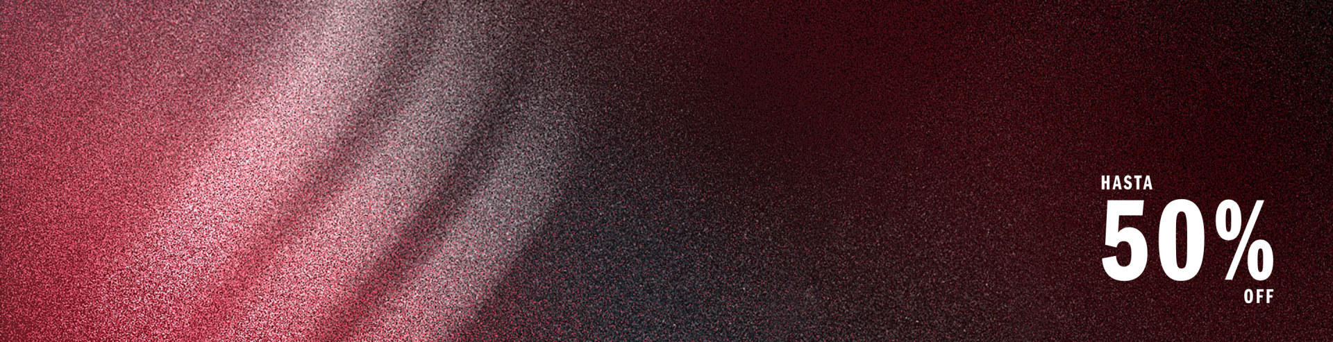 The image depicts a textured, burgundy-colored fabric or material, with a gradient effect that transitions from a lighter shade to a darker, more saturated tone.