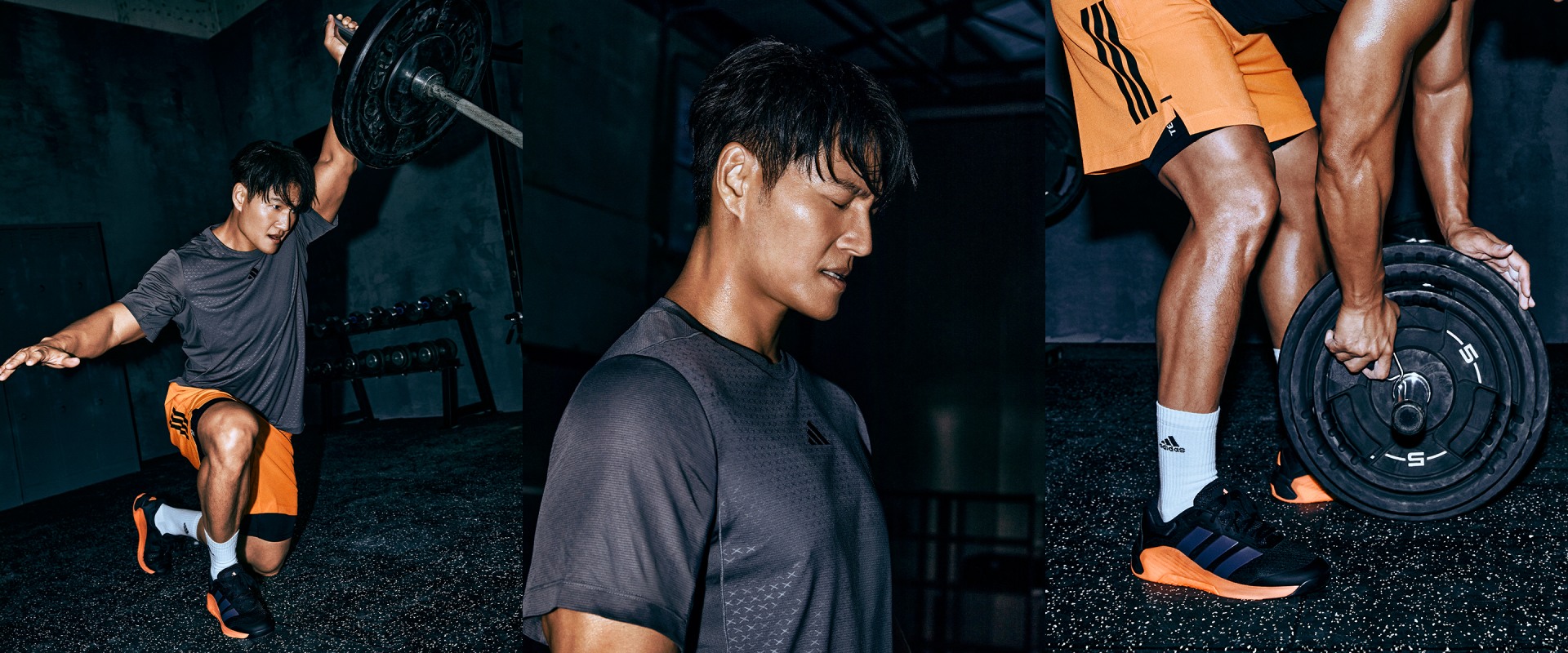 The image depicts a group of individuals wearing dark-colored athletic attire, with one person in the foreground appearing to be the focus of attention.