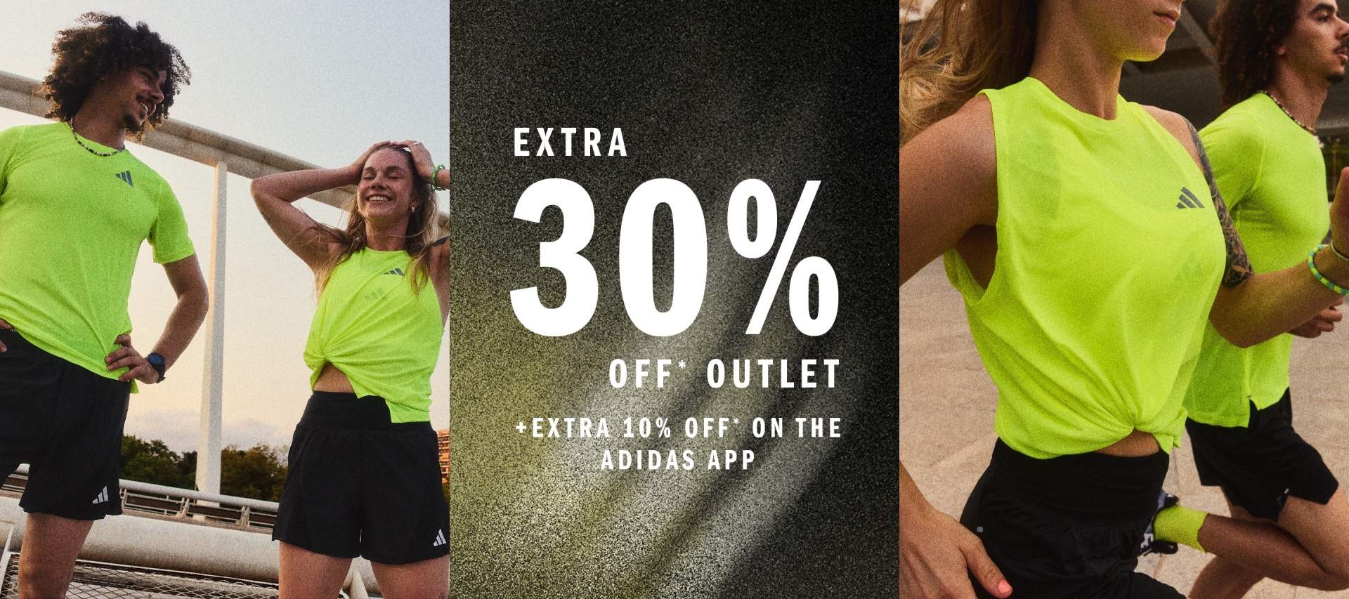 The image shows two people, a man and a woman, wearing bright neon green athletic tops, standing in front of a large sign advertising an extra 30% off outlet sale on the Adidas app.