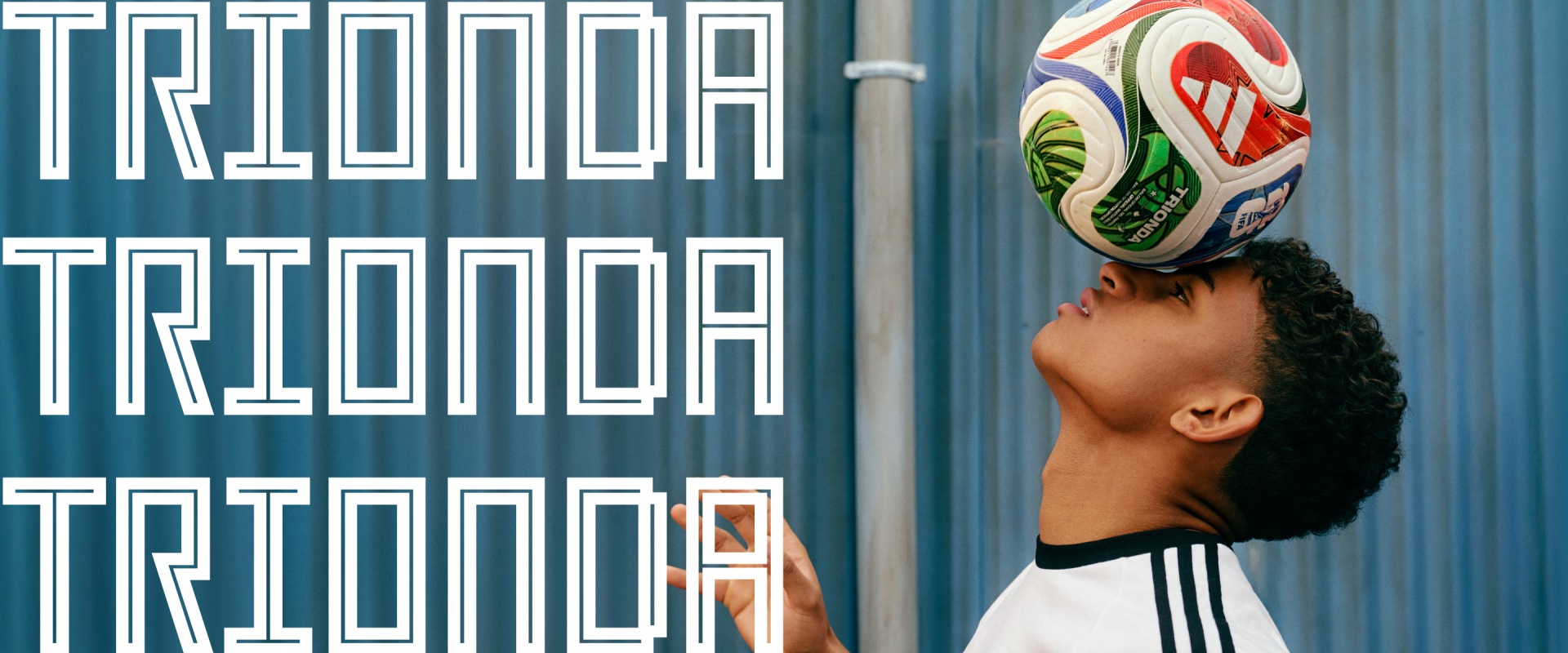 The image shows a person wearing a soccer jersey and holding a soccer ball, standing in front of a wall with the word "Pionoa" repeated multiple times.