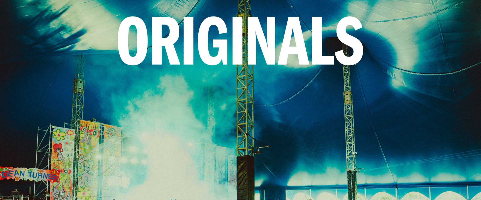 The image features the word "ORIGINALS" prominently displayed in large white text against a vibrant, colorful background of construction cranes and a cloudy sky.