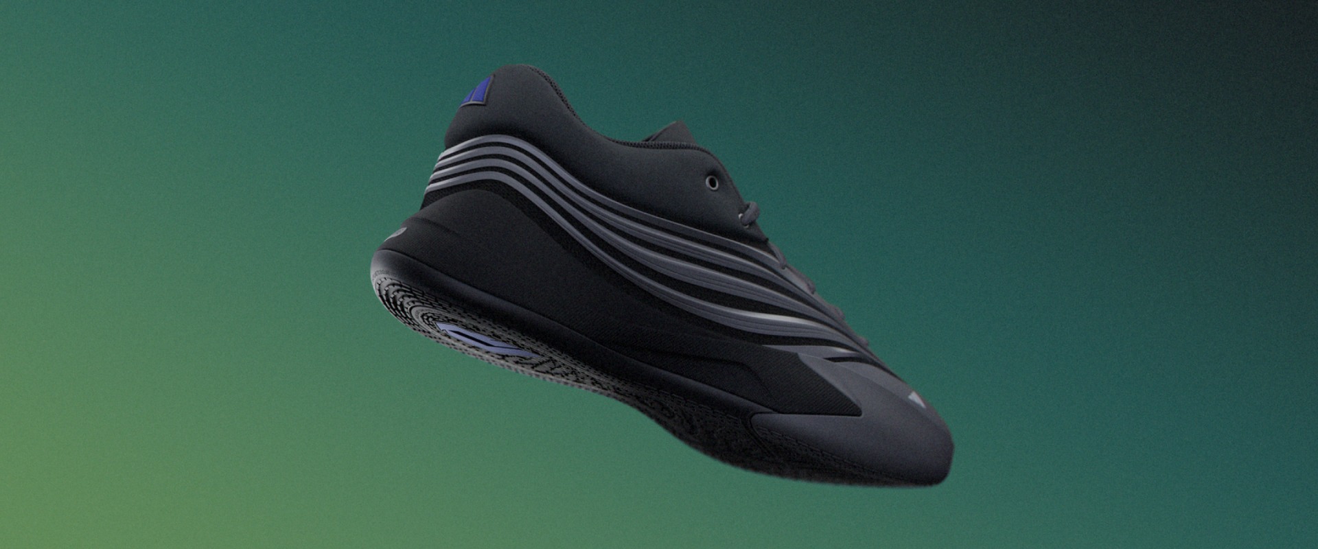 A black and gray athletic shoe with a distinctive design, set against a vibrant green background.