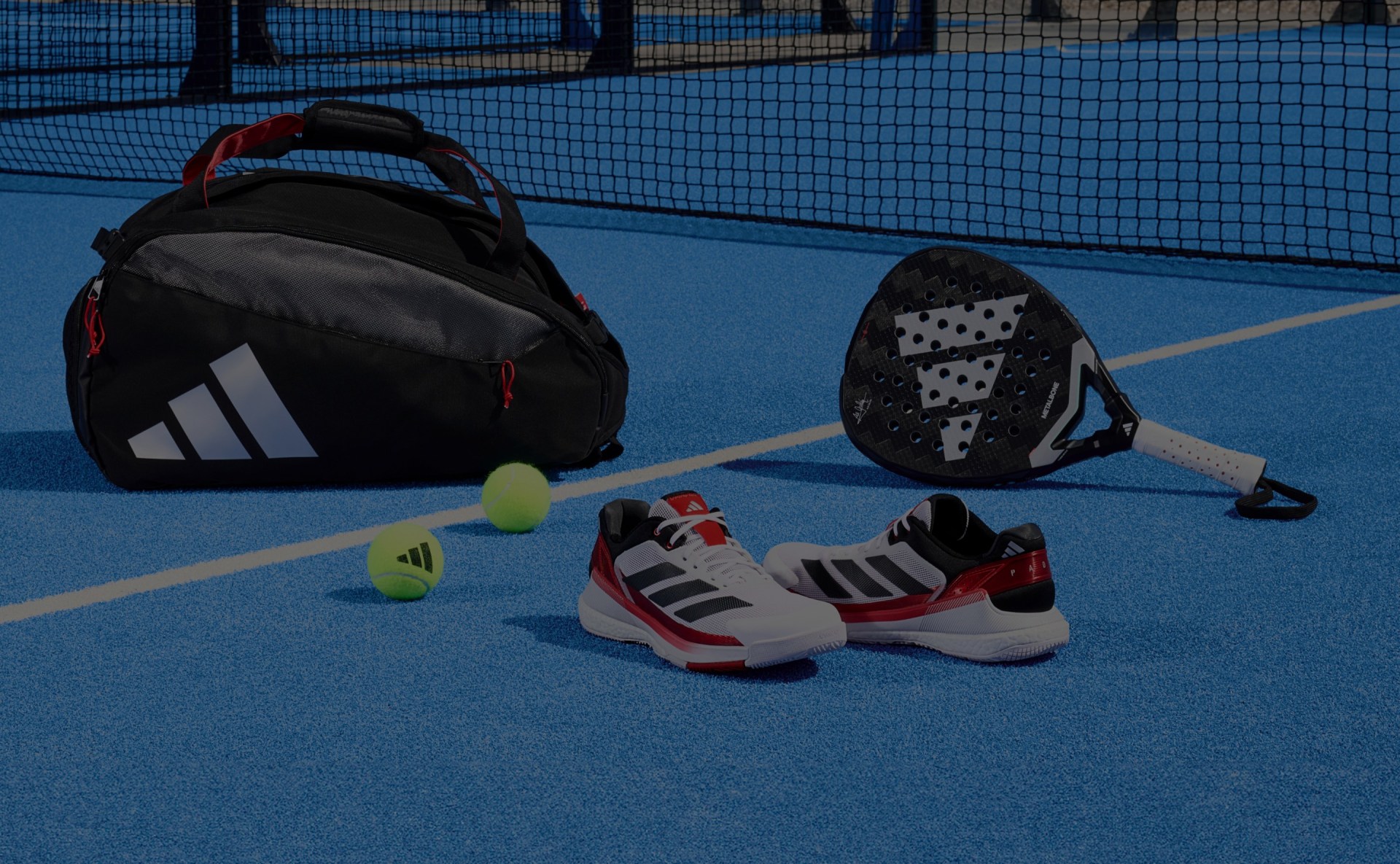 Padel bag, Padel racket and a crazyquick boost mens padel shoes on a padel court