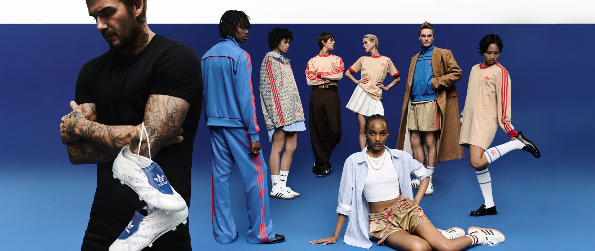 A group of diverse individuals wearing various stylish outfits, posing against a vibrant blue background.