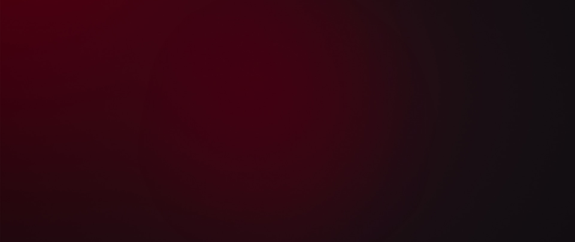 The image is a solid, deep burgundy or maroon-colored background, with no other visible elements or objects.