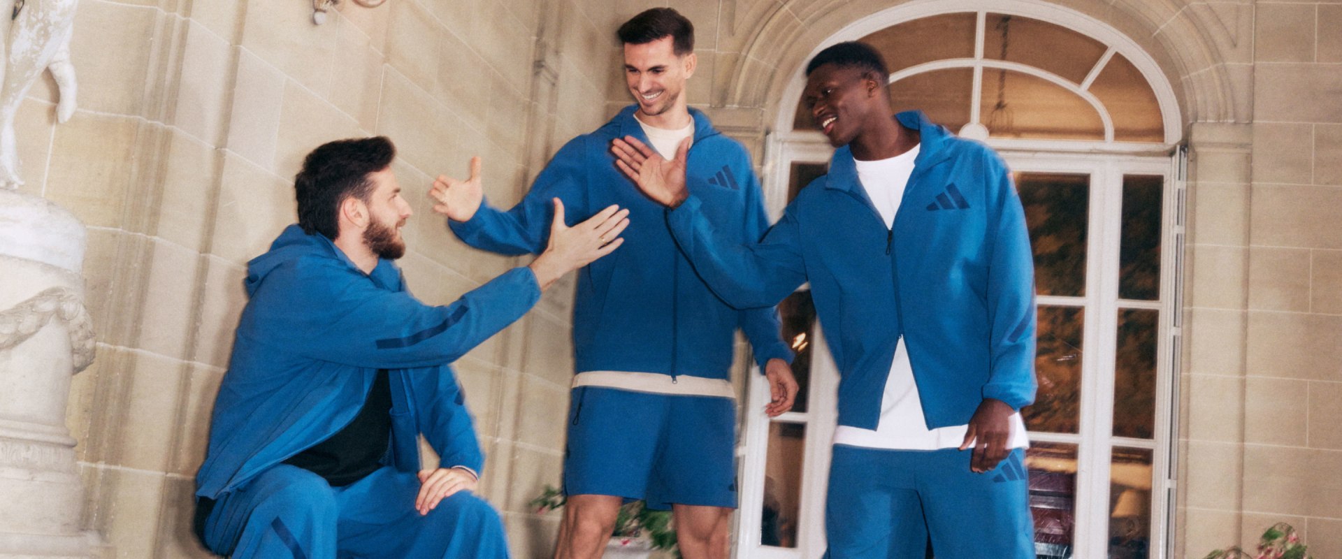 An image of Paris players Nuno Mendes, Fabian Ruiz & Khivicha Kvaratskhelia wearing outfits from the new ADIDAS Z.N.E. range.