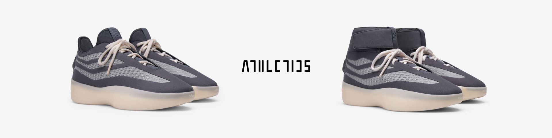 Two pairs of adidas x Fear of God Athletics II Basketball D-Rose
sneakers in dark grey with light soles and beige laces. The left pair is low-cut, and the right pair is high-top. The word "ATHLETICS" appears in stylized text between them.