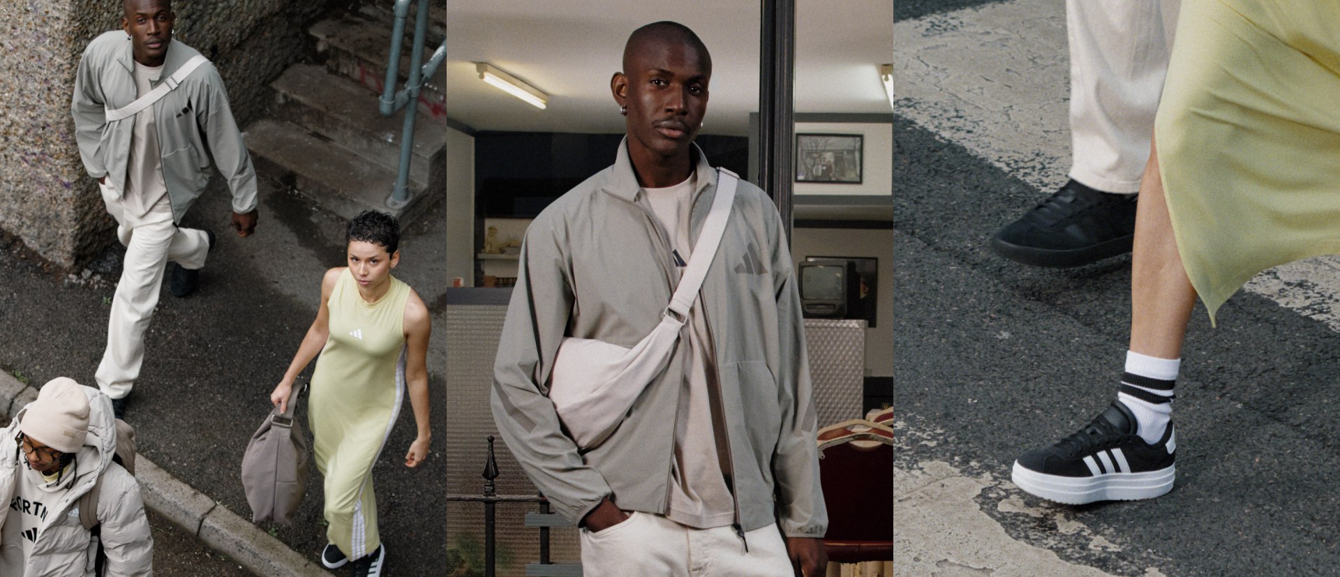 The image shows a man wearing a long, flowing gray robe standing in a dimly lit interior space, with a woman in a light-colored dress visible in the background.