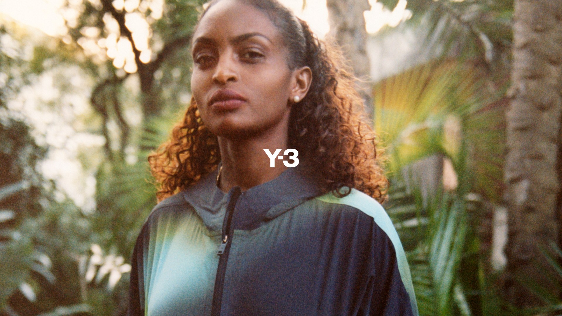 A front on photograph depicts record breaking runner Tigst Assefa in the Y-3 ADIZERO Running collection.