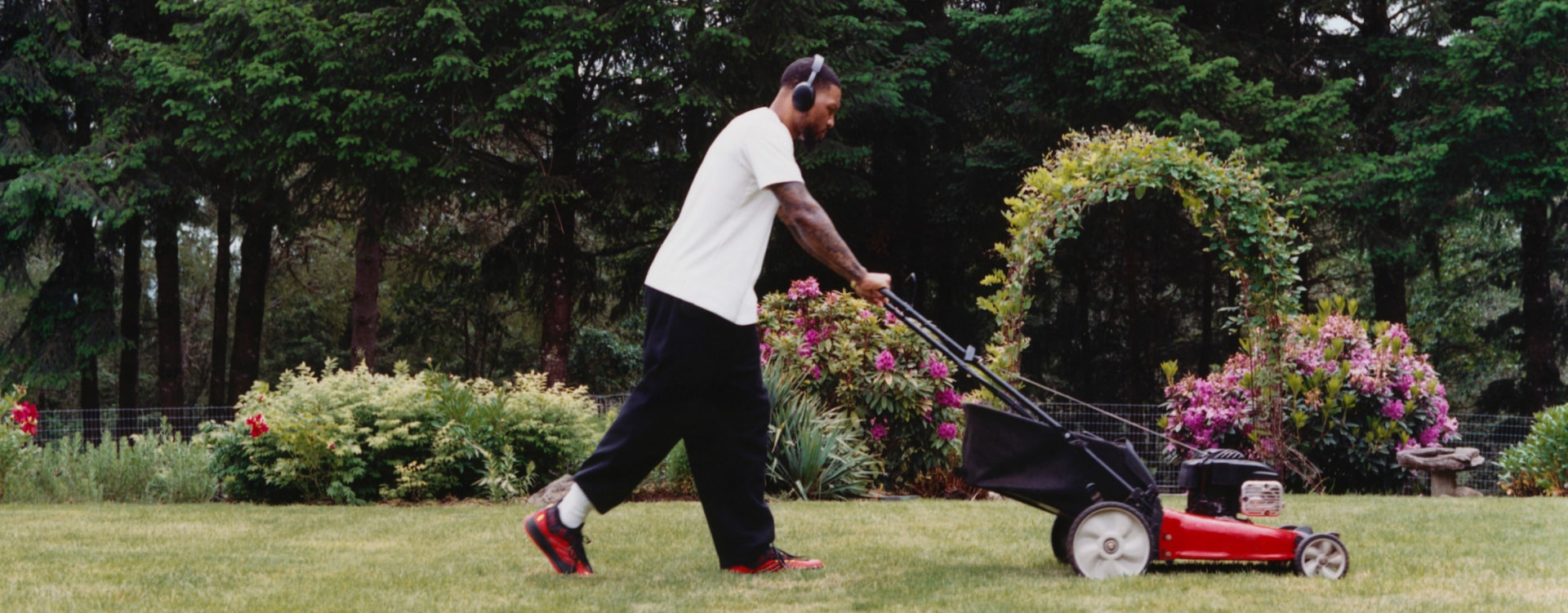 Damian Lillard mows the lawn in the new adidas BAPE Dame 9 collection.