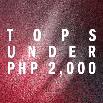 The image displays the text "TOPS UNDER PHP 2,000" against a burgundy-colored background with a textured, glittery appearance.