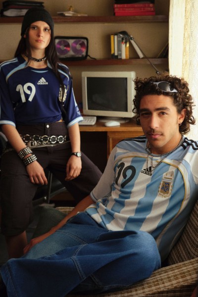 Three men wearing FC Real Madrid lifestyle gear