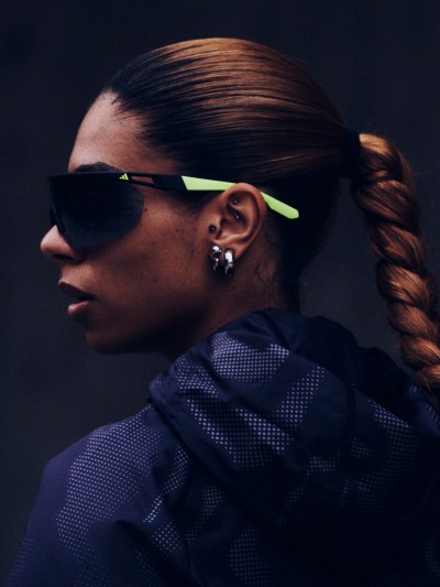 close up on female runner in sunglasses