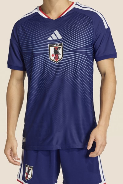 Image of a man wearing a football jersey